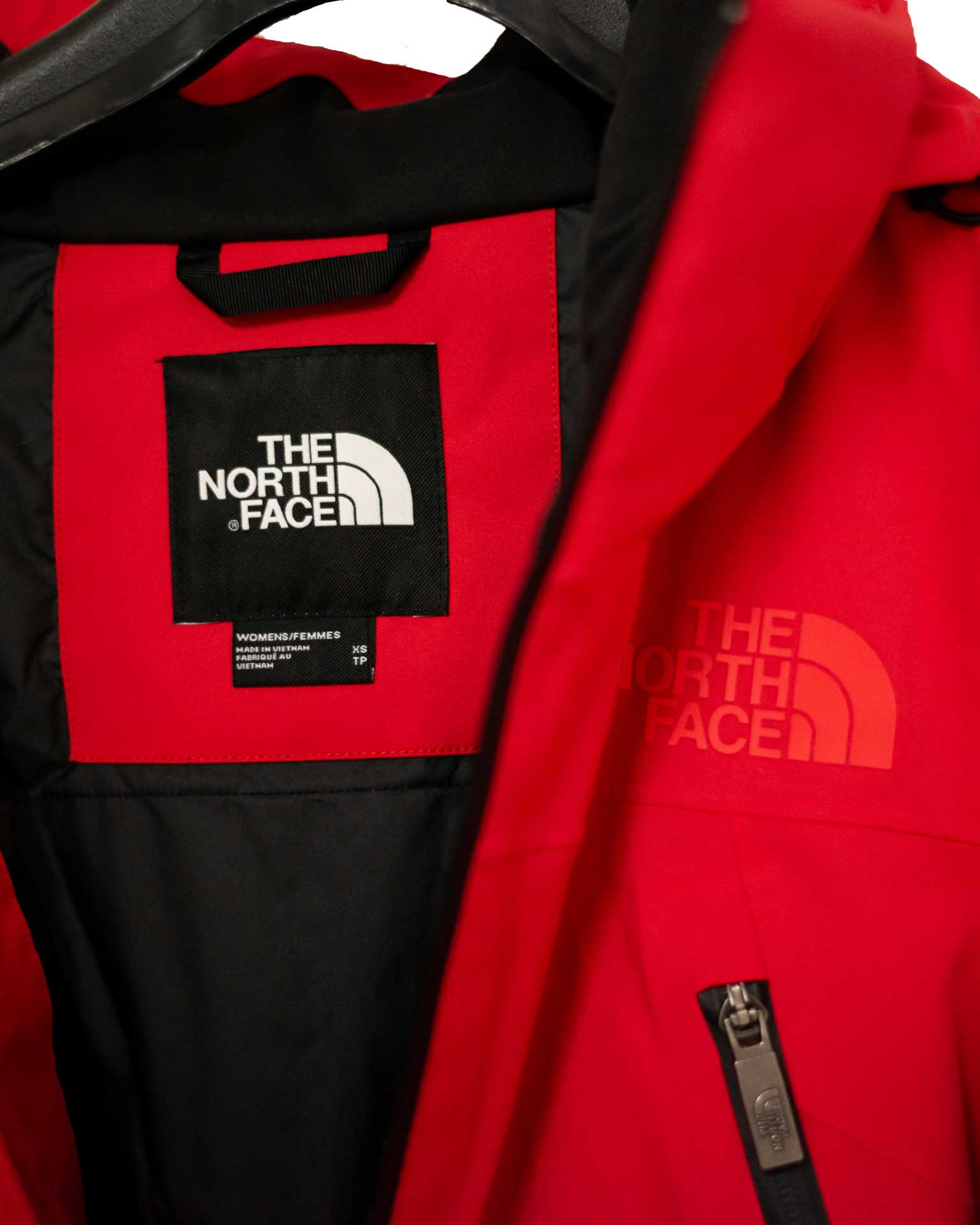 The North Face Lightweight hooded jacket in red